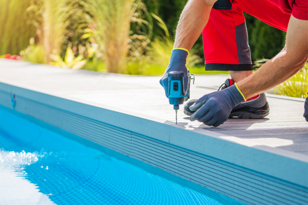 California Custom Pools crew installs deck by new pool
