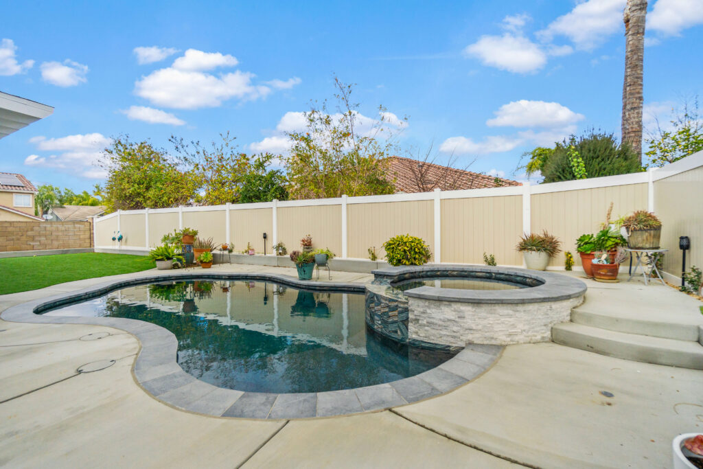 Backyard California custom pool and raised circular spa