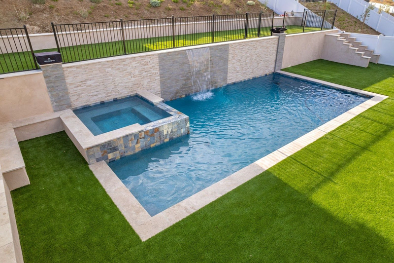 California custom pool with spa and waterfall feature