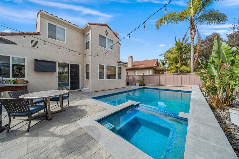 Modern backyard pool and spa by California Custom Pools