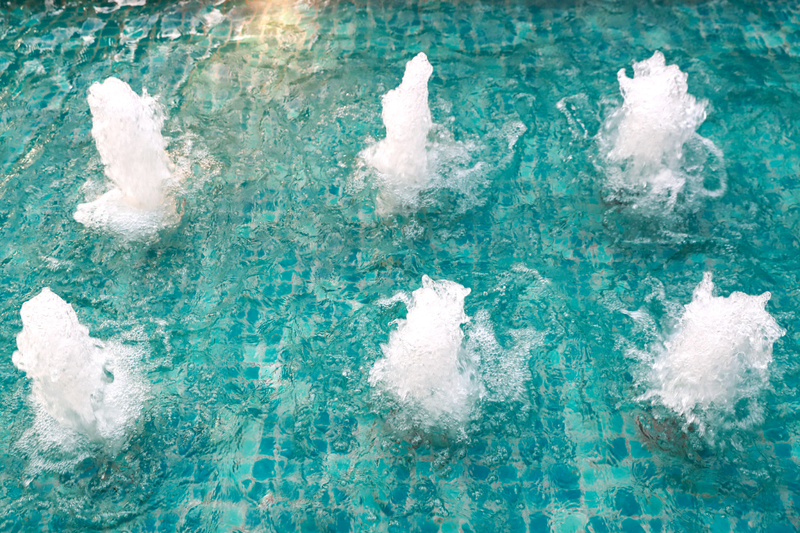 California custom pool water jets with bubbling spa effect